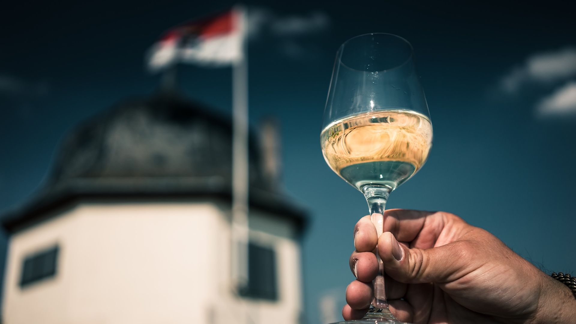 Winemaker Jay Hicks holds a glass of Riesling from Winery J. Hicks